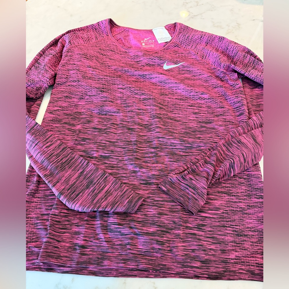 Nike Women’s Dri-FIT long-sleeve running shirt w/pink/black pattern, size L, EUC
